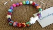 pulsera-bolas-estampadas-cruz-llenadegracia