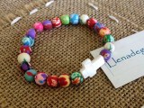 pulsera-bolas-estampadas-cruz-llenadegracia